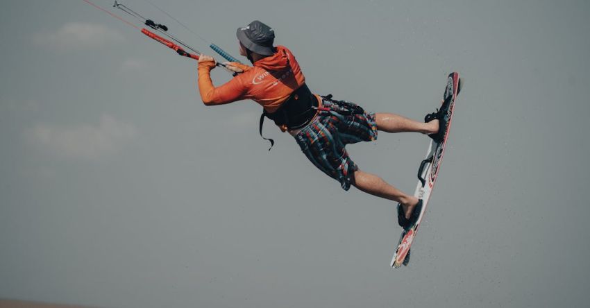 Tillage Equipment - A man kiteboarding in the air