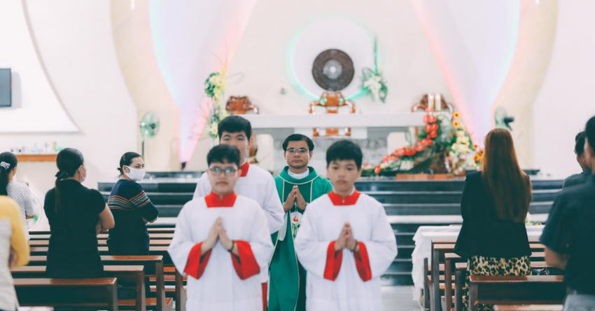 Tillage Practices - Priest and Altar Servers Performing Christian Ceremony in Church