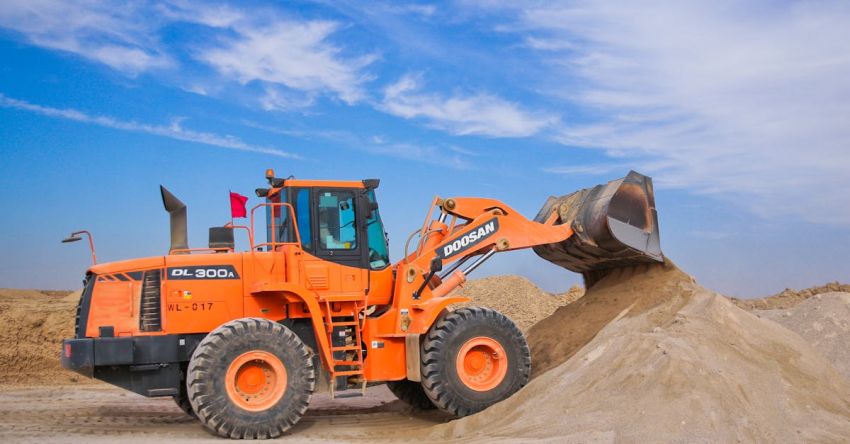 Tractors - Orange Excavator on Brown Hill