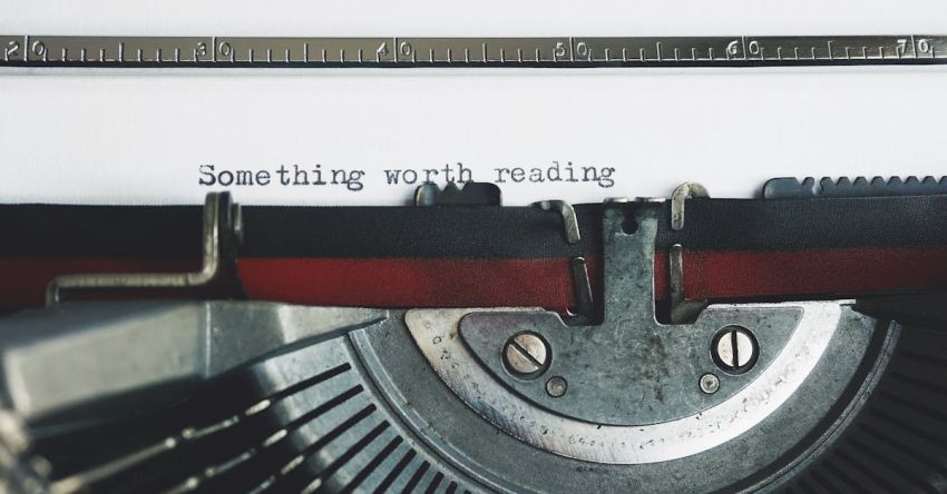 Precision Farming Equipment - Black and Red Typewriter on White Table